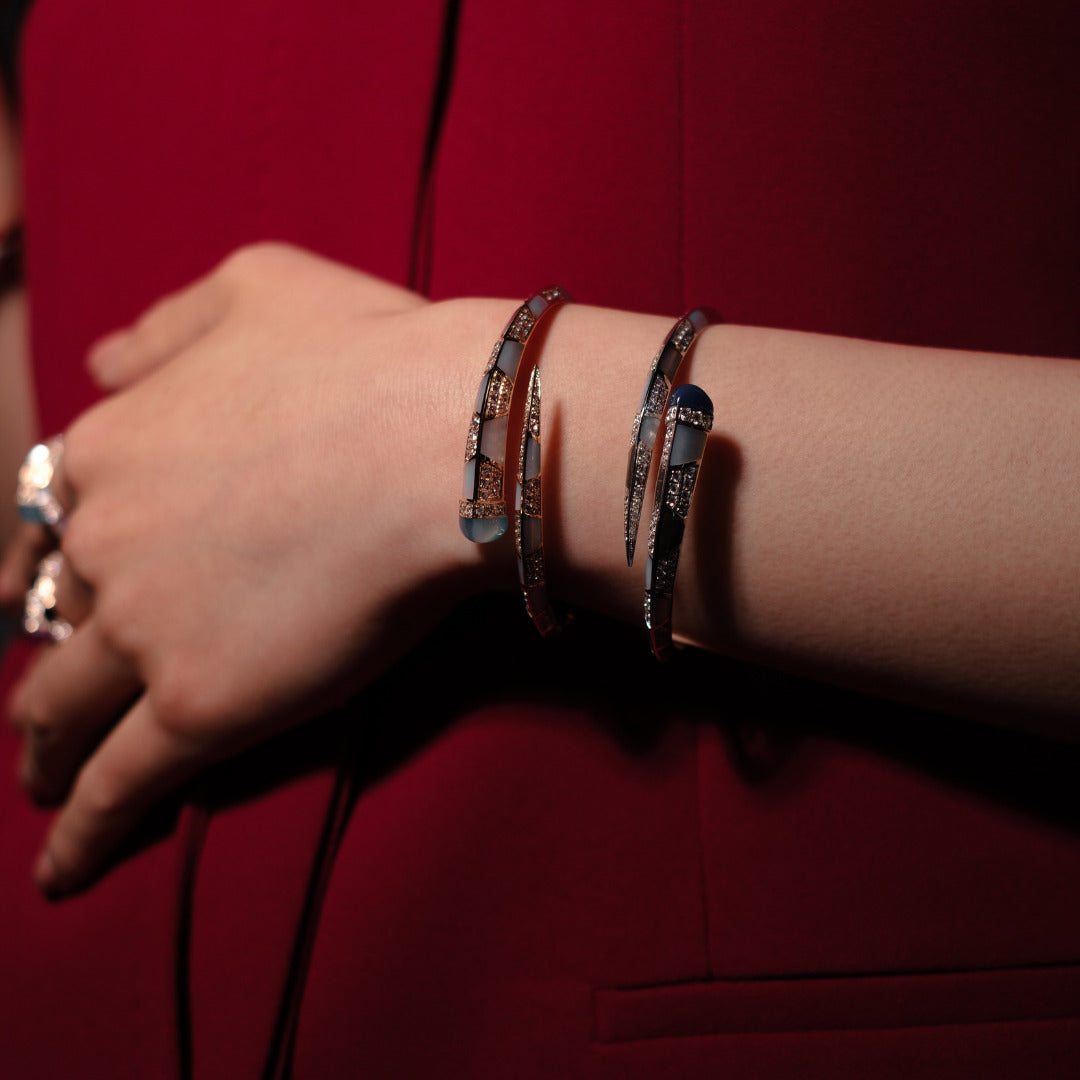 Diamond bracelets styled with a red outfit