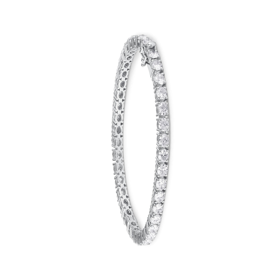 Oval-cut diamond tennis bangle in 18K gold