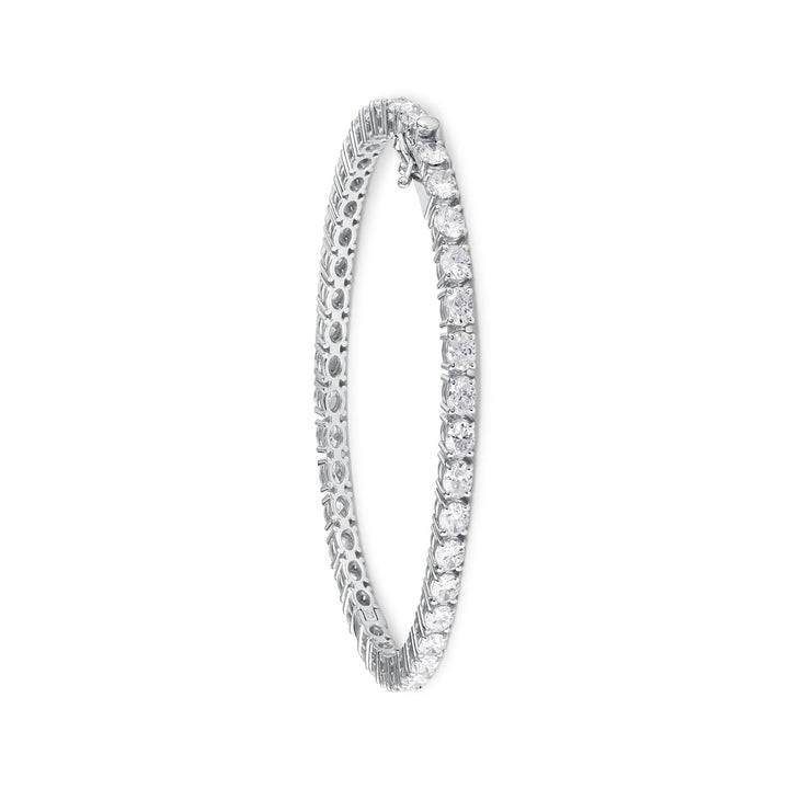 Oval-cut diamond tennis bangle in 18K gold