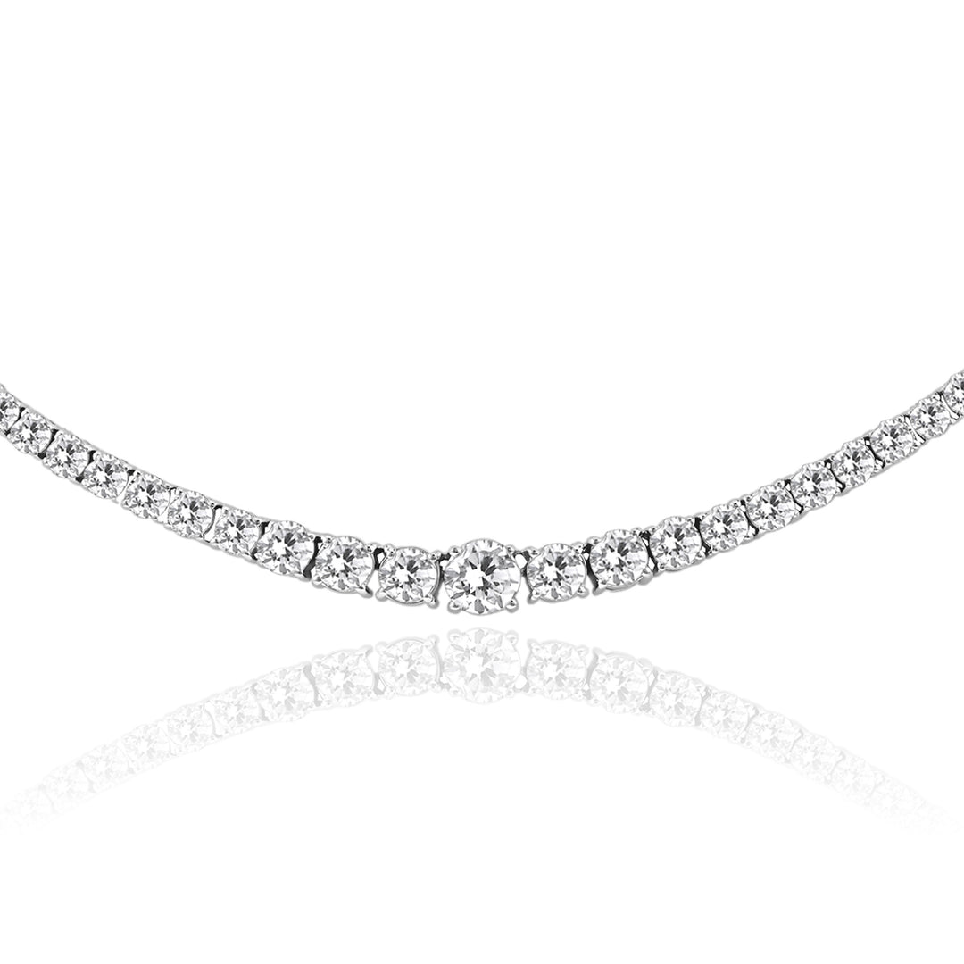 Close-up of round-cut diamond tennis necklace in 18K gold