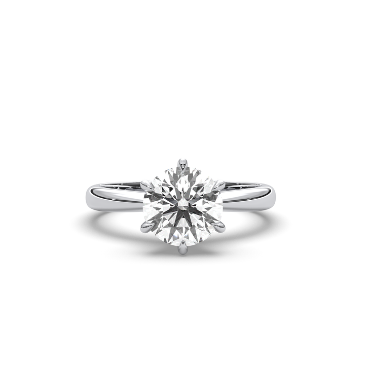 Round diamond solitaire engagement ring in 18K gold