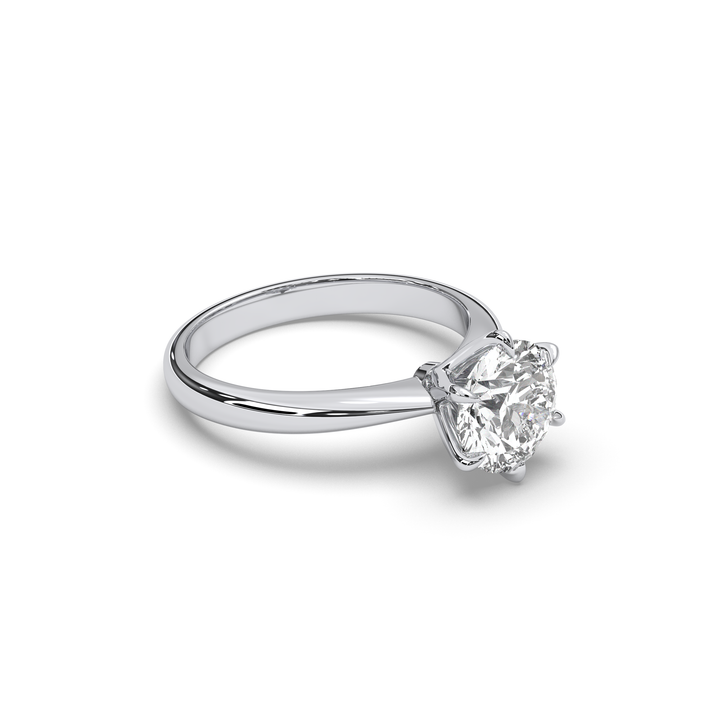 Round diamond solitaire engagement ring in 18K gold