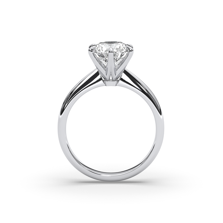 Round diamond solitaire engagement ring in 18K gold