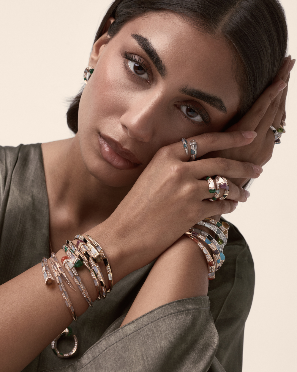 Model wearing Soit Belle Artistry diamond bangles and rings with natural gemstones