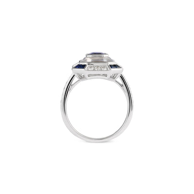 exuberant white gold diamond ring with blue sapphire