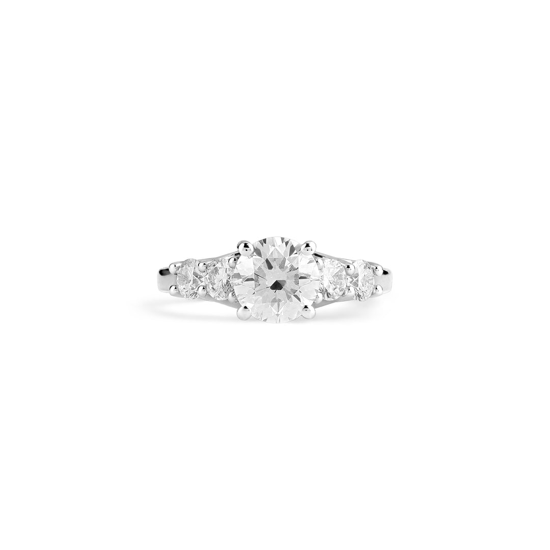 Classic round diamond solitaire ring in 18K gold
