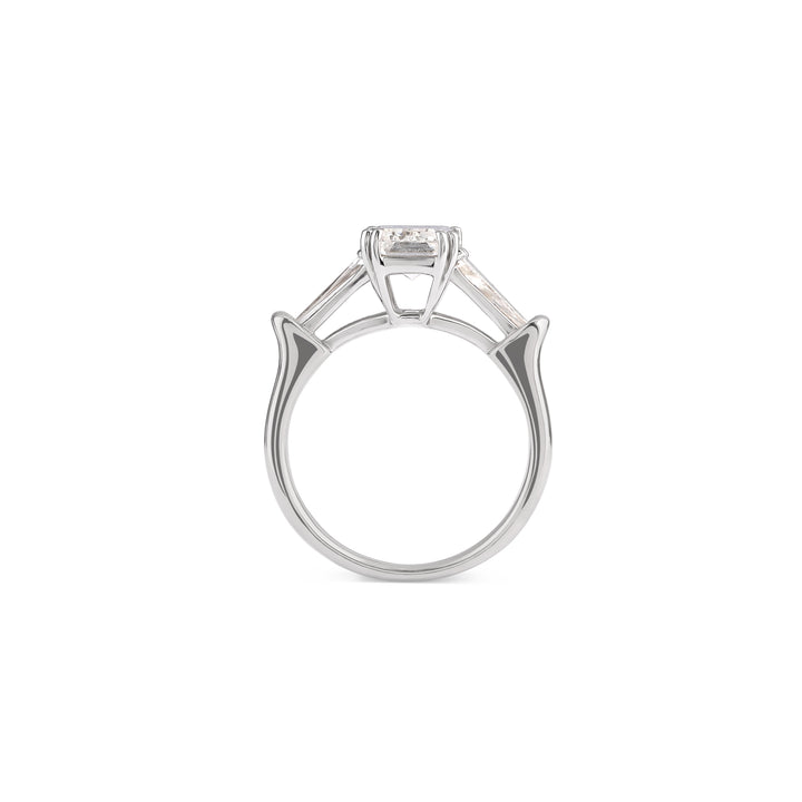 Emerald-cut three-stone diamond solitaire ring in 18K gold