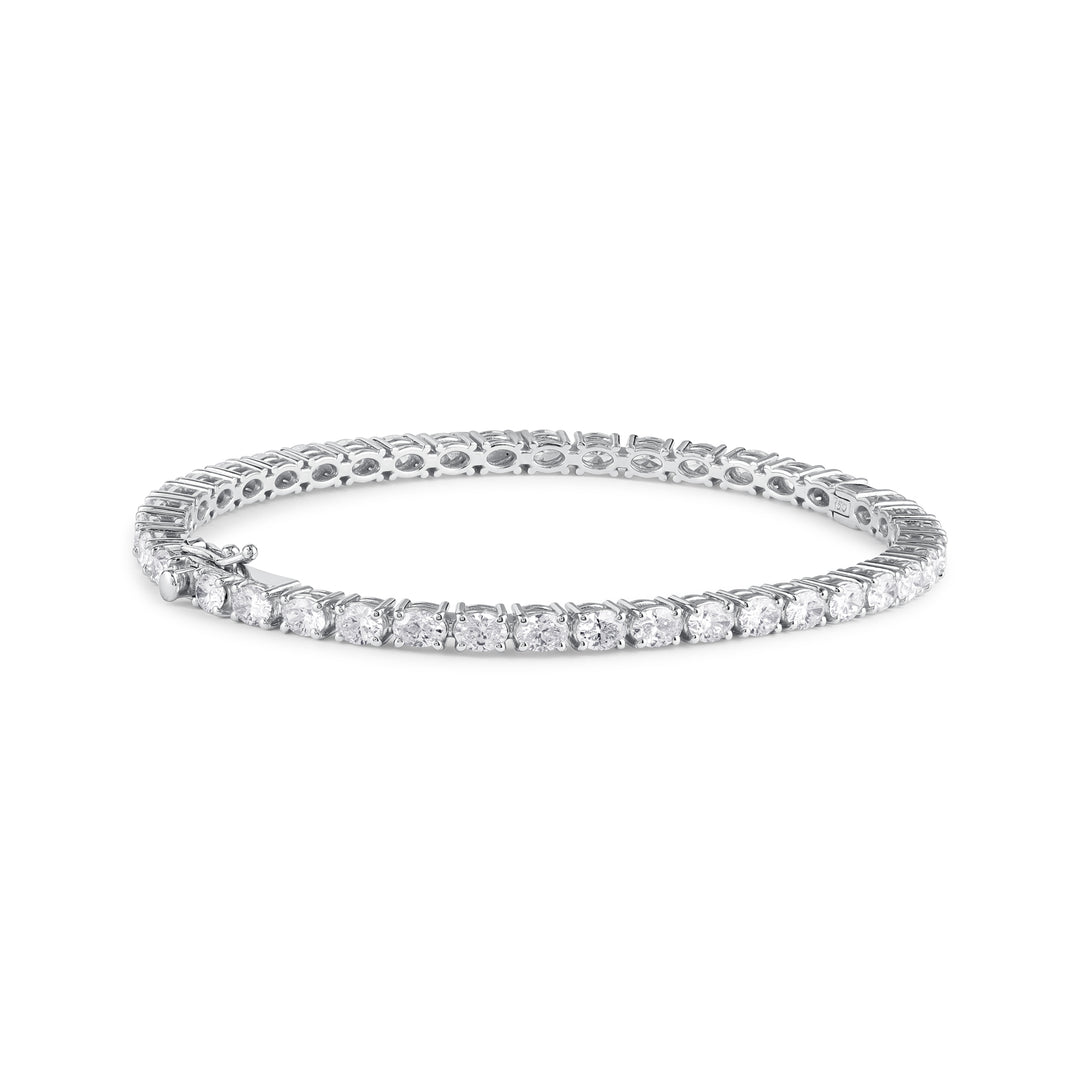 Oval-cut diamond tennis bangle in 18K gold