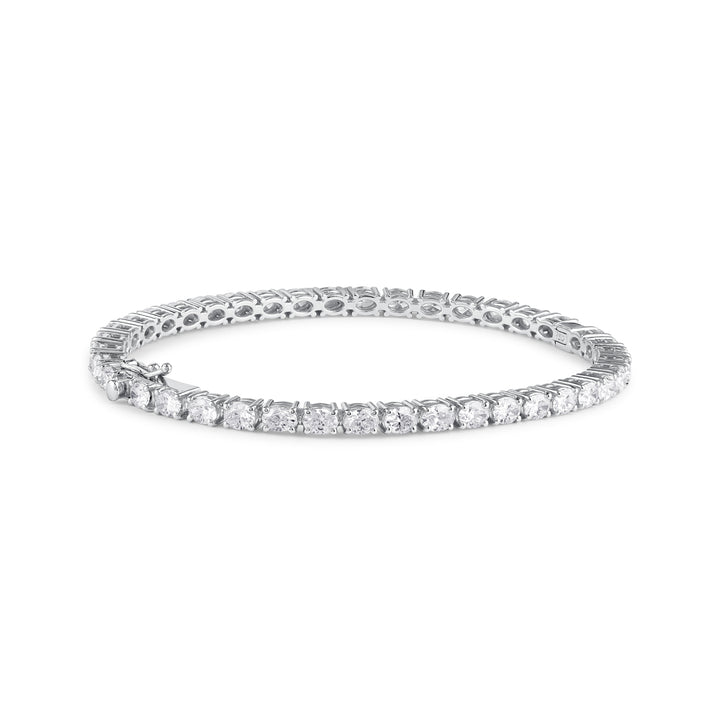 Oval-cut diamond tennis bangle in 18K gold