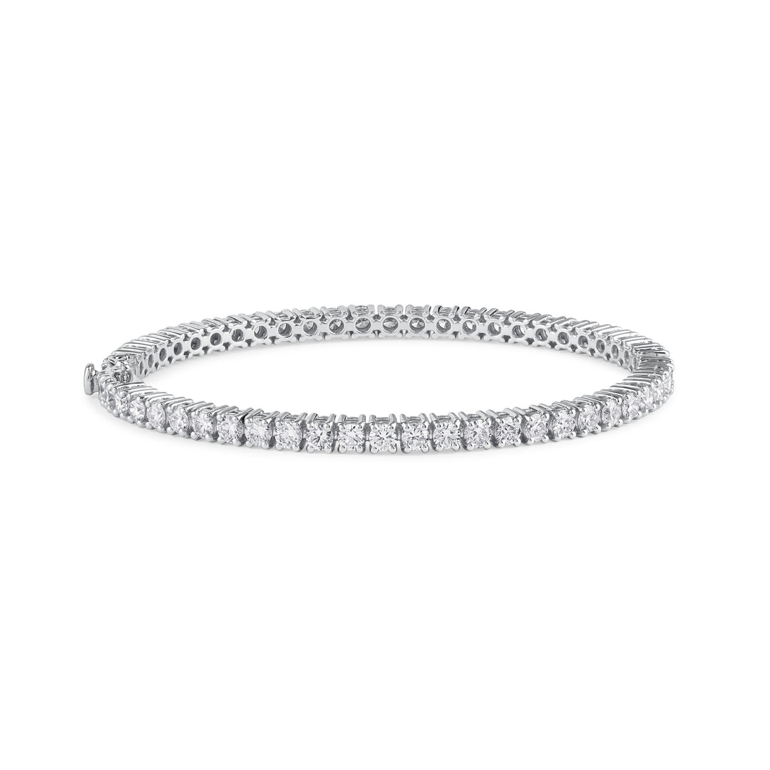 Round-cut diamond tennis bangle in 18K gold