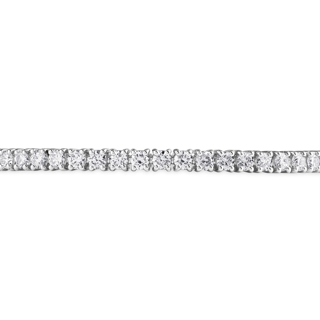 Round-cut diamond tennis bangle in 18K gold